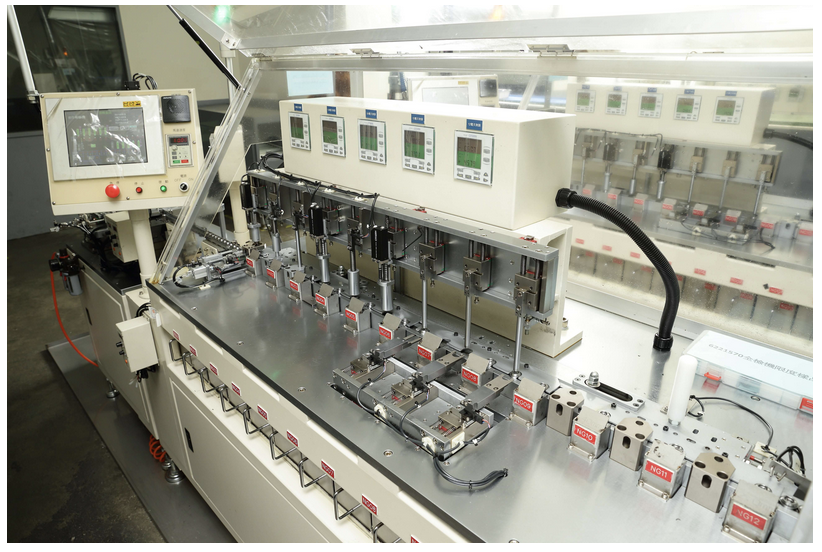 Automated multi-station dimensional inspection line with digital readouts and sorted NG lanes for Taiwan CNC quality control